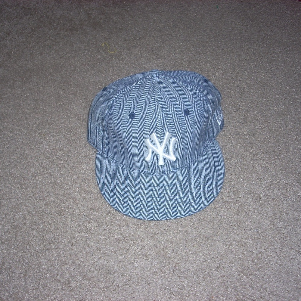 New Era hat.